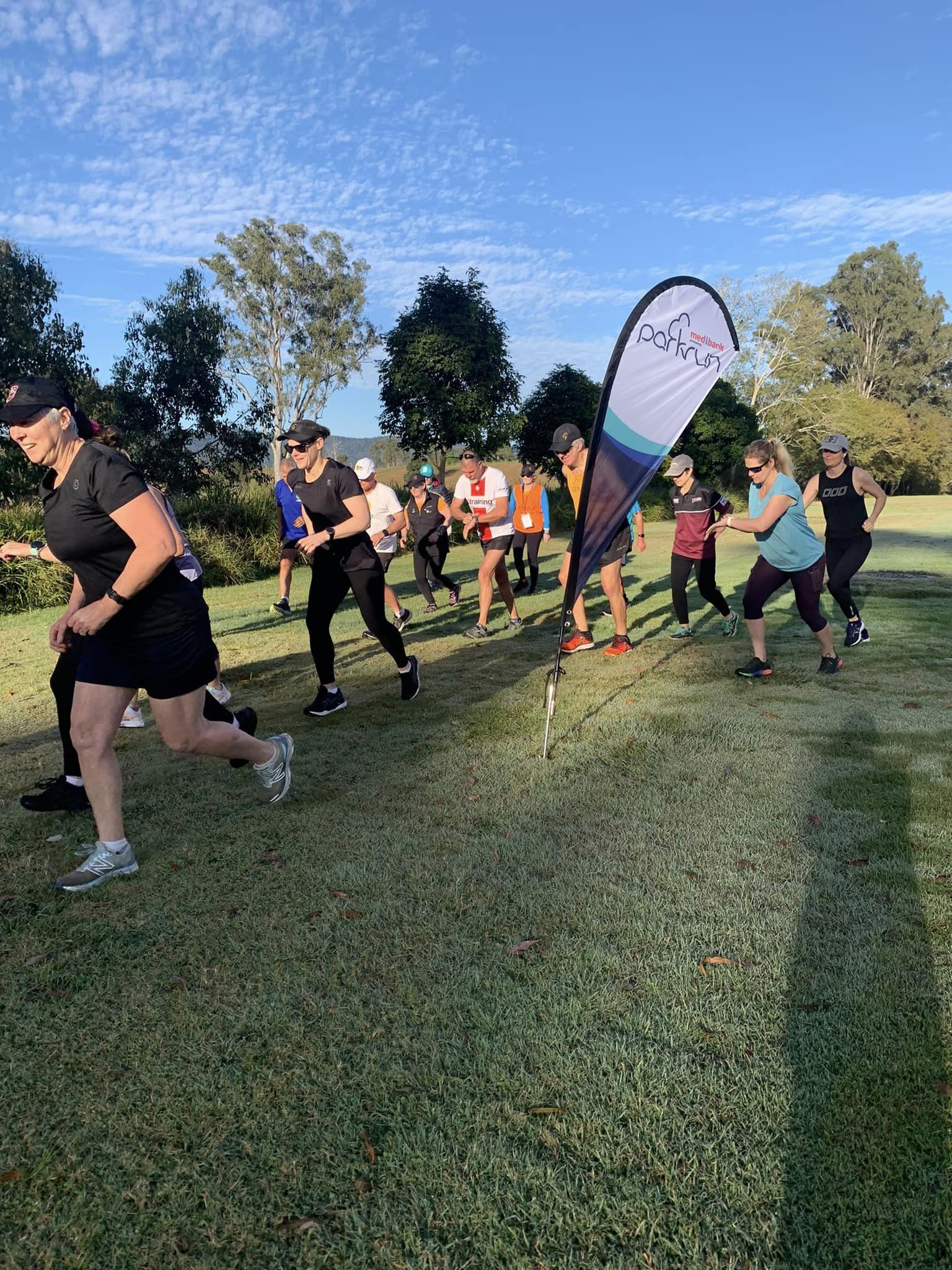 Yowie Parkrun at Kilcoy with a group of people starting the run.